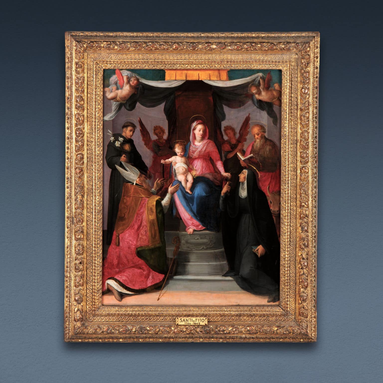 Madonna in trono con Bambino tra angeli e i santi Nicola da Tolentino